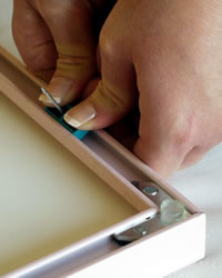How To Hang Metal Picture Frames with TrackMaster